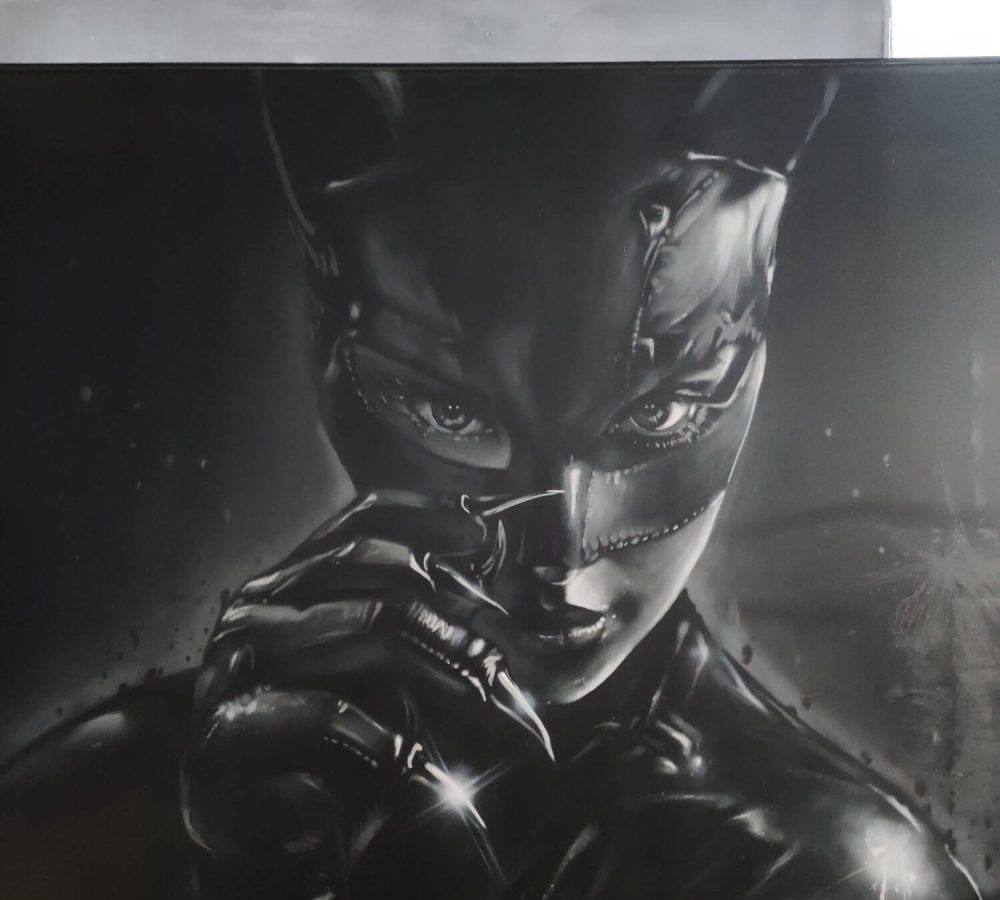 Mural de graffiti en Gimnasio