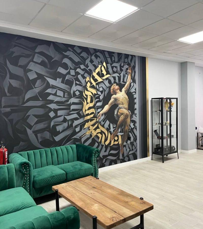 Mural de graffiti en estudio de tatuajes de Valencia
