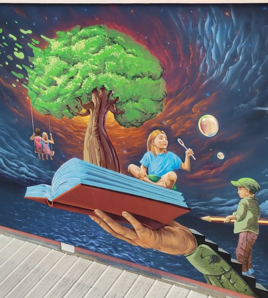 Mural de graffiti en Colegio